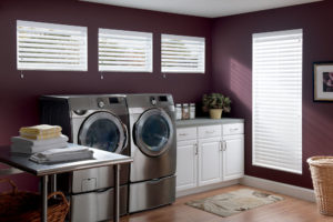 Faux wood blinds in a laundry room